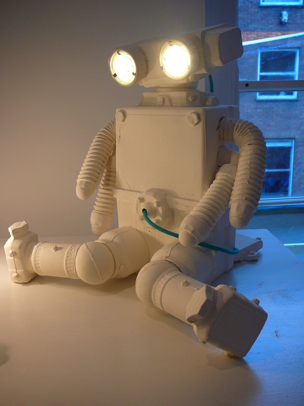 White "Robot" light by Matias Liimatainen