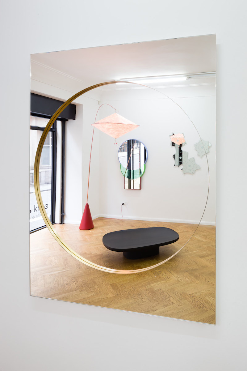 Aoyama Lamp by Studio Wieki Somers; Geta Black Coffee Table by Ronan & Erwan Bouroullec; Squarable Lune Mirror by Doshi Levien; Tournesol Mirror by Alessandro Mendini—reflected in Universe Mirror by Pierre Charpin