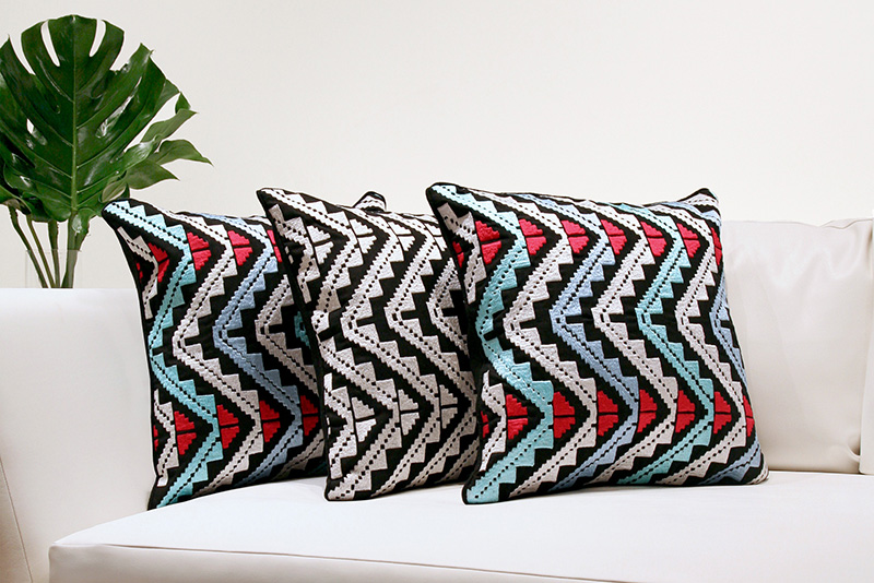 Multicolored and Black&White Guadalupe Pillows. Image courtesy of Inigo Elizalde and L'ArcoBaleno