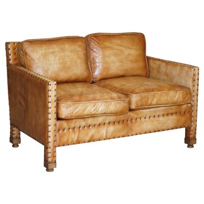 Rustic tan 2024 leather sofa
