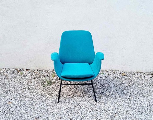 Turquoise mid 2024 century chair