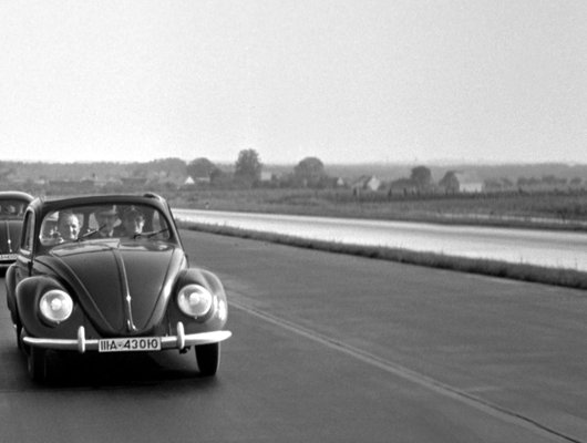 Two Volkswagen Beetles on the Highway, Germany, 1938 for  display picture 1