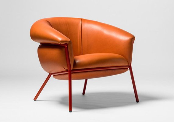 Stephen Burks Grasso Orange Leather Armchair and Foot Stool for sale at Pamono