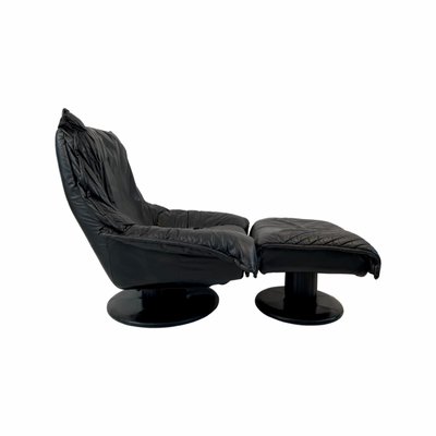 Vintage Black Leather Swivel Lounge Chair With Matching Footstool Set Of 2 For At Pamono Black Leather Swivel Lounge Chair, Vintage Recliner Chair Black