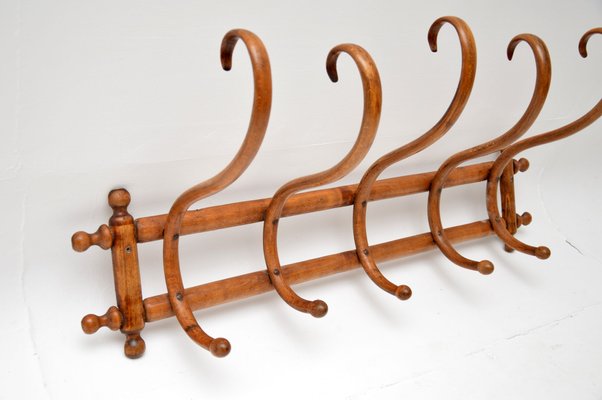 wall mounted interior design architectural salvage A pair of vintage metal french coat/hat hooks