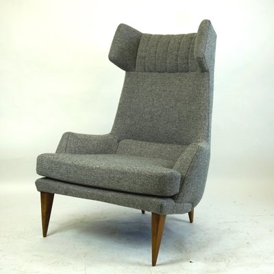 Oswald armchair deals