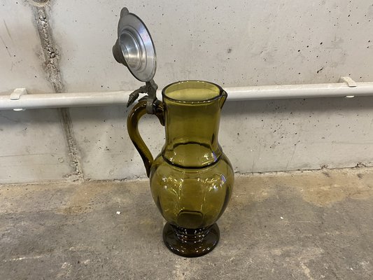 https://cdn20.pamono.com/p/g/1/0/1067781_z0efnkk23p/antique-glass-jug-with-tin-lid-1890s-7.jpg