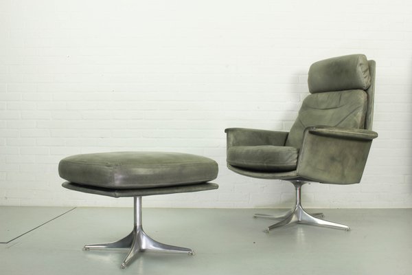 Swivel chair with matching ottoman deals