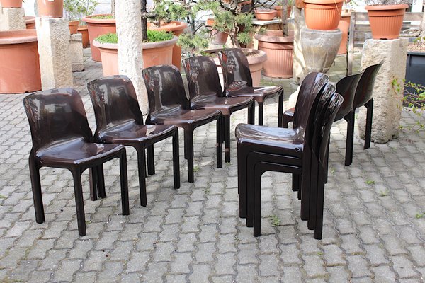 Brown plastic 2024 stackable chairs