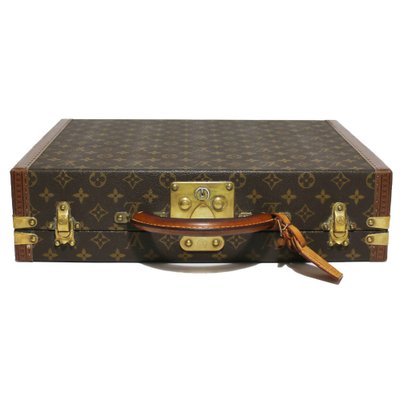 Past auction: Two small zip Louis Vuitton travel cases 1970s
