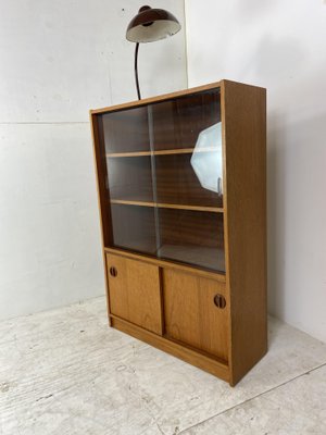 https://cdn20.pamono.com/p/g/1/0/1092245_elfkima18w/scandinavian-teak-display-cabinet-1960s-2.jpg