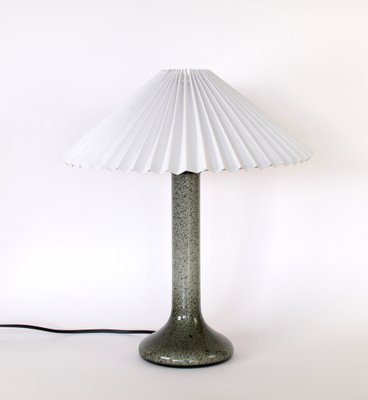 Table lamp with pleated shade top
