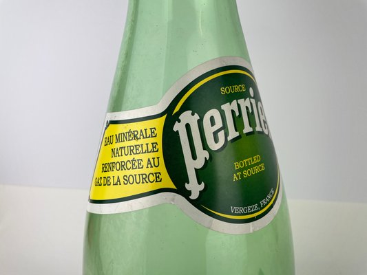https://cdn20.pamono.com/p/g/1/1/1107196_lqma7iwt9q/large-promotional-french-perrier-mineral-water-bottle-1990s-5.jpg
