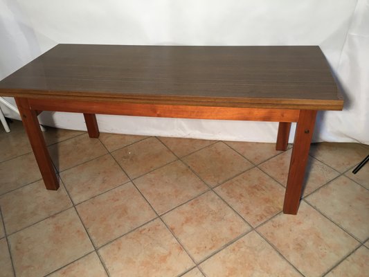 Extendable dining table used top