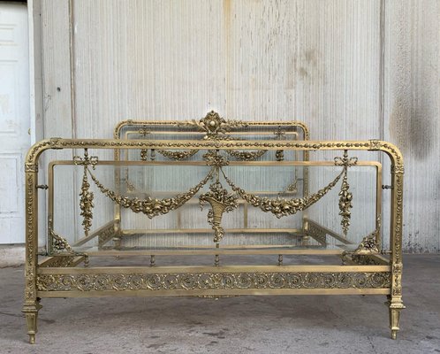 Glass store bed frame