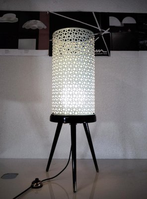 Perforated store floor lamp