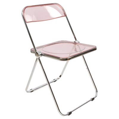Pink lucite chair sales