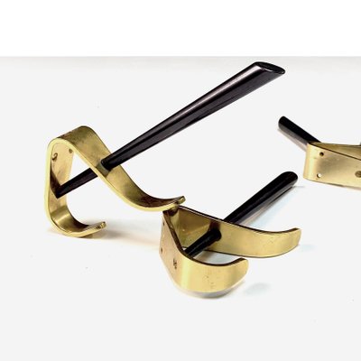 Modern brass coat hooks store