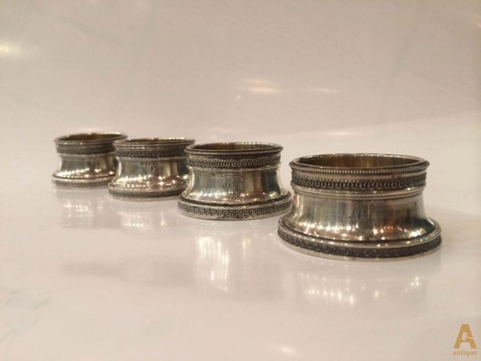 Lot 254 - Eight silver napkin rings,