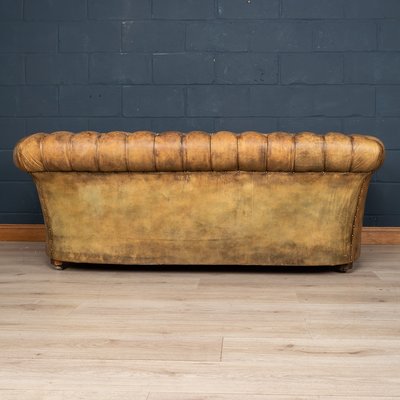 Tan chesterfield store leather sofa