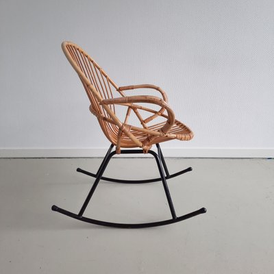 Wrought iron rocking outlet chair
