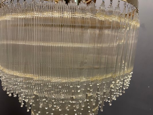 Acrylic and brass chandelier on sale
