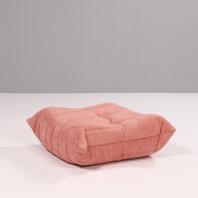 Pink armchair with footstool top