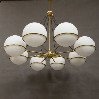 Brass chandelier with glass hot sale globes