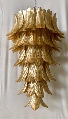 Gold palm leaf ceiling light outlet