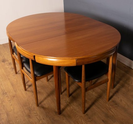 Rounded Teak Dining Table Chairs By, Round Dining Table With Chairs That Fit Underneath