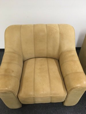 Cream leather lounge chairs sales