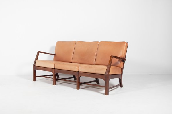 Wooden sofa with leather seats deals