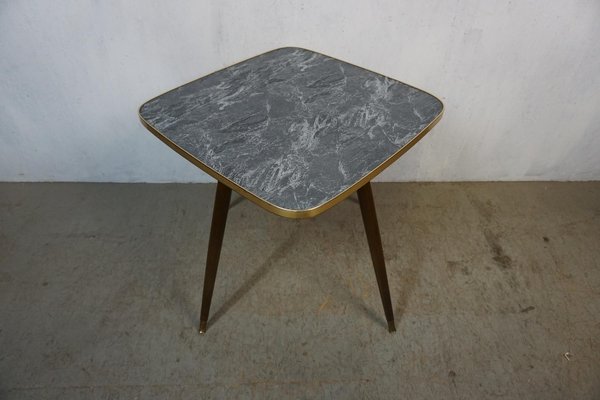 Rotating side table store