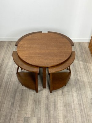 Round table store with nesting chairs