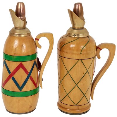 https://cdn20.pamono.com/p/g/1/1/1171748_xfyp3mhwtc/vintage-wooden-thermos-pitchers-italy-1950s-set-of-2-1.jpg