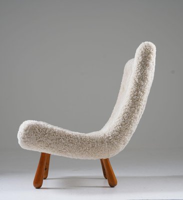 Mid-Century Scandinavian Lounge Chair in Sheepskin for sale at Pamono