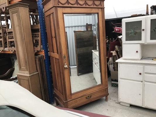 Second hand wardrobe with cheap mirror