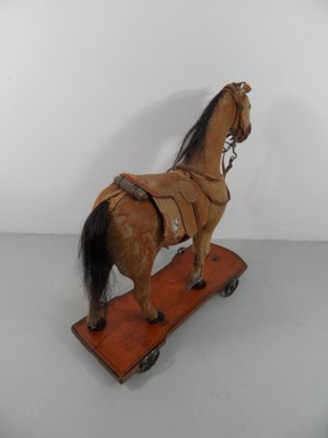 Antique toy cheap horse on wheels
