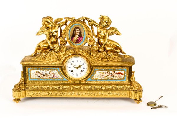 Pendule Borne En Porcelaine Peinte Et Bronze Doré