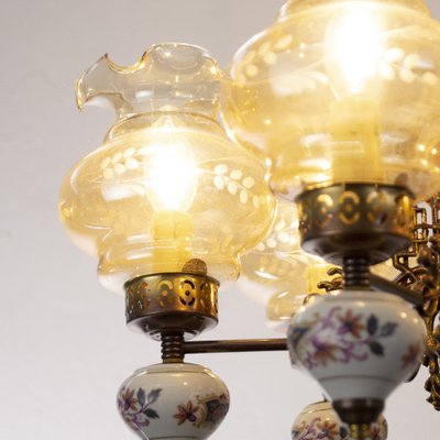 PAIRE D'APPLIQUES en verre opalescent à deux bras