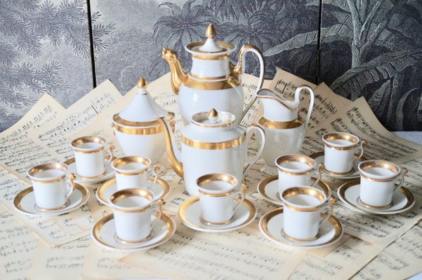 https://cdn20.pamono.com/p/g/1/2/1285519_c4xki399pm/antique-empire-french-porcelain-coffee-service-paris-1800s-set-of-13-1.jpg