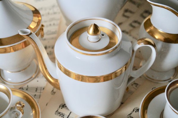 https://cdn20.pamono.com/p/g/1/2/1285519_gyu6e4wfri/antique-empire-french-porcelain-coffee-service-paris-1800s-set-of-13-5.jpg
