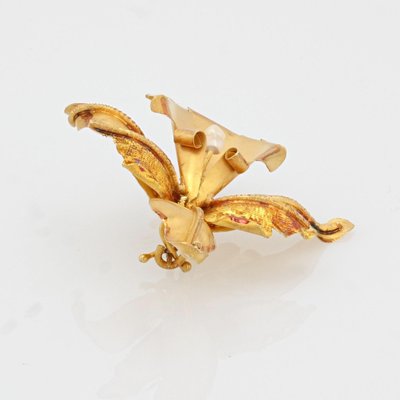 Spilla a forma di giglio in oro giallo, 18 carati, anni '60
