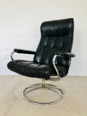 Vintage Norwegian Ekornes Stressless, Black Leather Reclining Chair And Footstool