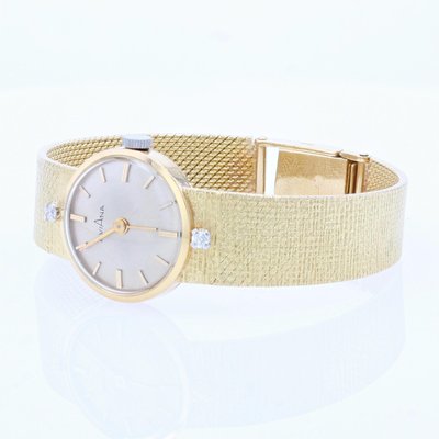 Orologio Eviana in oro giallo a 18 carati, Francia, anni '60 in vendita su  Pamono