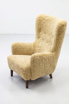 Danish Modern High Back Sheep Skin Armchair for sale at Pamono