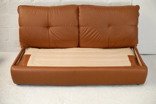 Leather convertible 2024 sofa bed