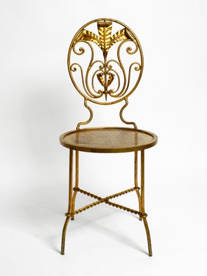 Gold iron chair deals