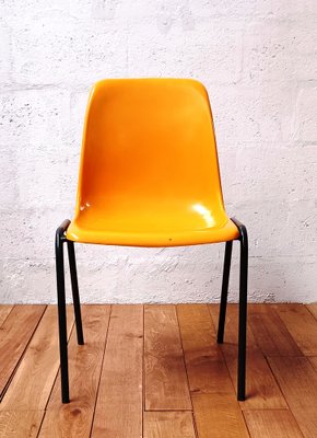 Orange plastic chairs deals