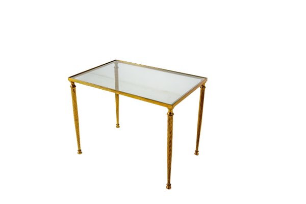 Glass coffee table with brass legs hotsell